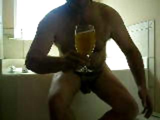 sissyboy drinks his own urinate